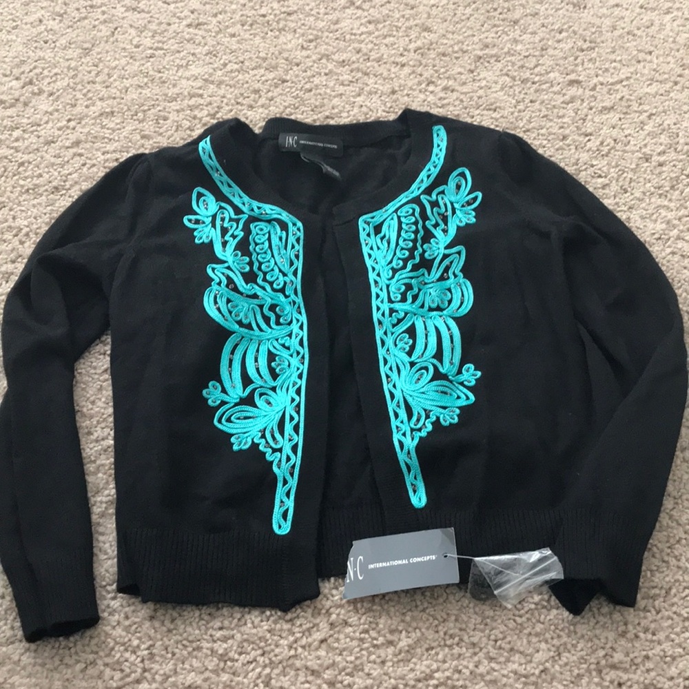 Black shrug with design